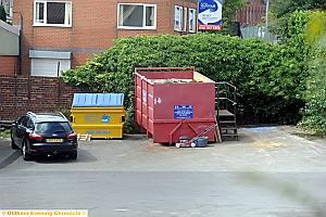 HEAVY load . . . a similar industrial bin (right)
HEAVY load . . . a similar industrial bin (right)