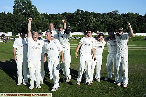 MILES OF SMILES . . . Royton players celebrate semi-final success over Walsden. Picture by CHRIS SUNDERLAND 
Keith McHugh 
