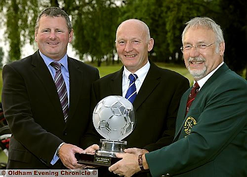 TROPHY TIME: Steve Taylor (left) receives the memorial trophy from Paul Hopkinson and Captain Gordon Lamb (right).
TROPHY TIME: Steve Taylor (left) receives the memorial trophy from Paul Hopkinson and Captain Gordon Lamb (right).