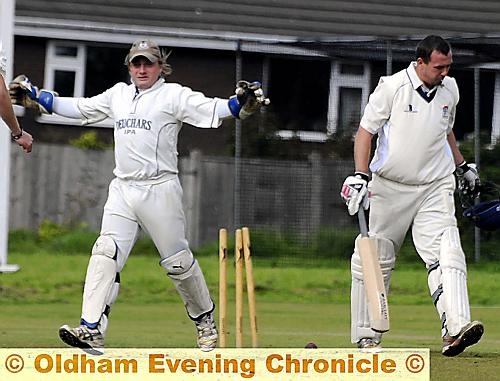 MAN IN FORM . . . Uppermill wicketkeeper Alex Griffiths will be hoping to celebrate again when he features for the Saddleworth and District League against the Lancashire County League. 