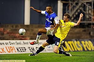 RUNNING GAME: Athletic forward Josh Parker is beaten to the ball as he makes a run down the right.  
