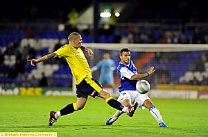ATHLETIC full-back Paul Black attempts to set up an attack. 