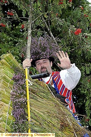 TOP of the world: Eddie Worrall wasn’t going to let a fear of heights stop him from riding Saddleworth’s 15ft-high rushcart. TOP of the world: Eddie Worrall wasn’t going to let a fear of heights stop him from riding Saddleworth’s 15ft-high rushcart.