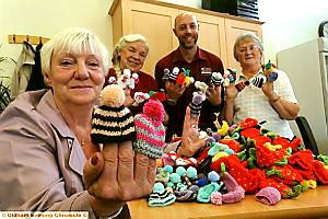 HAT’S off: Age Concern volunteers (from left) Vivien Coates (who knitted 754 hats), Miriam Bonworth, Mick Sheehan from Home Invited, and Shirley Evans HAT’S off: Age Concern volunteers (from left) Vivien Coates (who knitted 754 hats), Miriam Bonworth, Mick Sheehan from Home Invited, and Shirley Evans