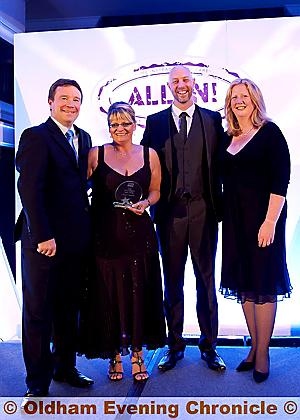 INVALUABLE . . . Home Instead UK co-founders Trevor and Sam Brocklebank (left and right) are joined by Home Instead Oldham owner Mick Sheehan to congratulate Amanda Looseley on being named Caregiver of the Year 

