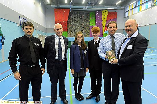 TALKING business: Terry Flanagan (right) welcome James Timpson watched by (from left) Craig Dean, Phil Wiggett, and Hulme Grammar School students Lauren Dyer and Josh Pickup
TALKING business: Terry Flanagan (right) welcome James Timpson watched by (from left) Craig Dean, Phil Wiggett, and Hulme Grammar School students Lauren Dyer and Josh Pickup