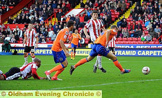 LATE DRAMA . . . Matt Smith prods home Athletic’s equaliser in the last minute of injury time. LATE DRAMA . . . Matt Smith prods home Athletic’s equaliser in the last minute of injury time.