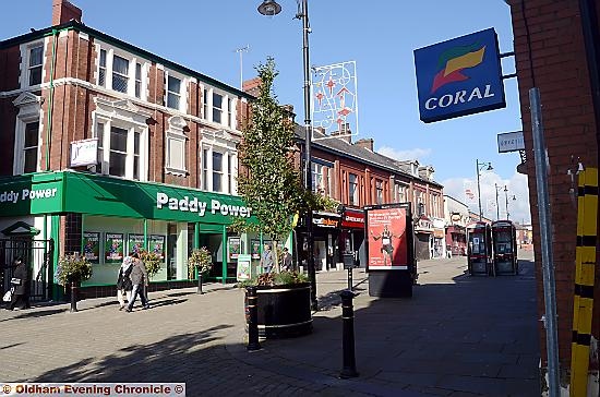 The new Paddy Power shop on Henshaw Street, Oldham — making the street Oldham's gambling centre, with five bookmakers and gaming centres within yards of each other
The new Paddy Power shop on Henshaw Street, Oldham — making the street Oldham's gambling centre, with five bookmakers and gaming centres within yards of each other