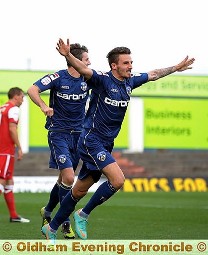 BREAKTHROUGH: Matt Derbyshire celebrates after putting Athletic in front in the 77th minute. 