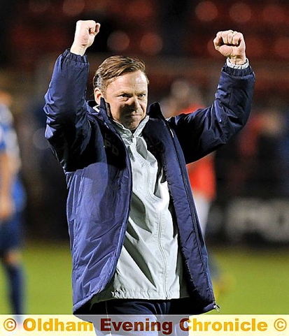 Manager Paul Dickov celebrates after a morale-boosting 2-0 win. Manager Paul Dickov celebrates after a morale-boosting 2-0 win.