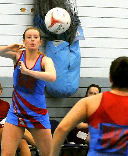 Georgie Webster shoots the ball to a team mate. Georgie Webster shoots the ball to a team mate.