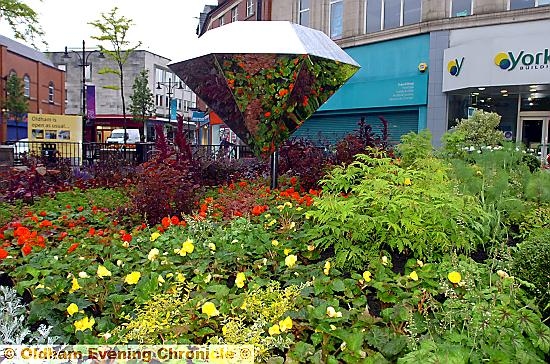 DIAMONDS are forever . . . the diamond floral display opposite the Spindles Shopping Centre
DIAMONDS are forever . . . the diamond floral display opposite the Spindles Shopping Centre