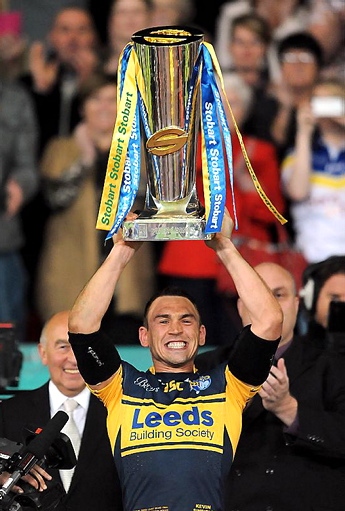 Leeds skipper Kevin Sinfield collects the Super League trophy Leeds skipper Kevin Sinfield collects the Super League trophy