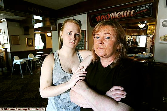 ROBBED of trust: April Grimes (right), landlady of The Britannia Tavern, Hollins, with daughter Katie Jones
ROBBED of trust: April Grimes (right), landlady of The Britannia Tavern, Hollins, with daughter Katie Jones