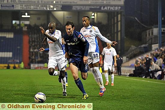 ATHLETIC’S goal hero Jonathan Grounds shows his Shrewsbury rivals a clean pair of heels. 