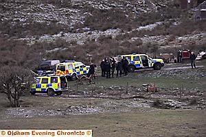 POLICE gathered as the incident moved to open land 

