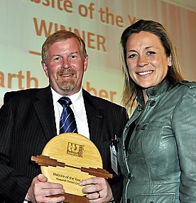 WELL done: Neale recieves the award from Sarah Beeny.
WELL done: Neale recieves the award from Sarah Beeny.