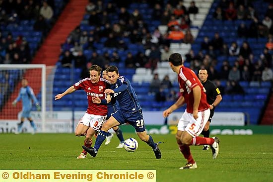 NO YOU DON’T . . . Jose Baxter finds his way to goal blocked by disciplined defending.