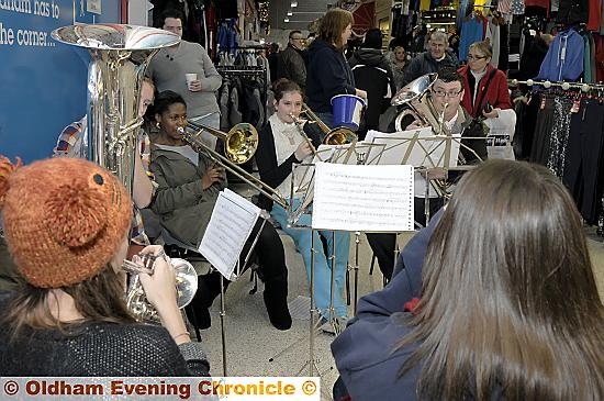 Tommyfield Market Hall at Christmas with the Oldham Brass Band. Tommyfield Market Hall at Christmas with the Oldham Brass Band.