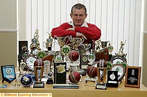 John Punchard with the many trophies he has won over the years. 