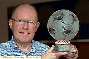 Alan Hardy with his award from the Manchester FA for his contribution to football
Alan Hardy with his award from the Manchester FA for his contribution to football