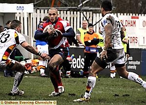 ON THE ATTACK: Miles Greenwood runs at the Dewsbury defence. 