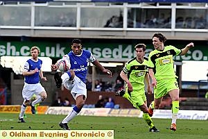 CLOSE CONTROL: Reuben Reid, one of the few positives for Athletic, displays skill and balance. CLOSE CONTROL: Reuben Reid, one of the few positives for Athletic, displays skill and balance.
