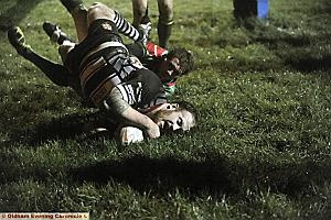 TRY TIME: Matt Bottom of Saddleworth Rangers crosses the line during the Standard Cup semi-final showdown with neighbours Waterhead at Shaw Hall Bank Road. 