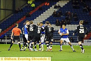 FLASHPOINT: Keanu Marsh-Brown is involved in a melee against Scunthorpe, which eventually saw the player receive his marching orders for a two-footed tackle seconds earlier. FLASHPOINT: Keanu Marsh-Brown is involved in a melee against Scunthorpe, which eventually saw the player receive his marching orders for a two-footed tackle seconds earlier.