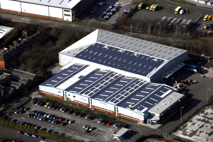 The firm's solar panel field covers a vast area of the roof 

