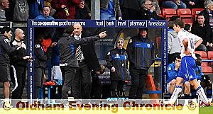 DUGOUT DUEL . . . Athletic boss Paul Dickov and his Rochdale counterpart John Coleman share their thoughts after James Tarkowski (right) is dismissed.