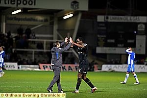 PUT IT THERE . . . Athletic boss Paul Dickov (left) and goal scorer Jean-Yves Mvoto show their delight after the win at Hartlepool. 