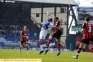 AERIAL COMBAT . . . Athletic striker Reuben Reid attempts to win a header. 