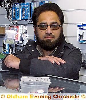 shop owner Mohammad Akhlaq Mirza 