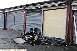 Charred remains were piled up outside the store following the arson attack 