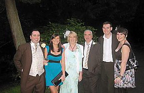HAPPIER times: Chris (second right) with his family 