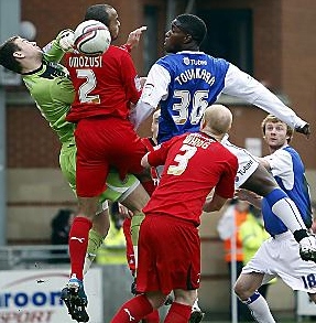 UP AND AT ‘EM . . . Oumare Tounkara gets stuck in against tonight’s opponents, Leyton Orient, last season.
UP AND AT ‘EM . . . Oumare Tounkara gets stuck in against tonight’s opponents, Leyton Orient, last season.