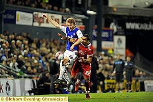 THAT’S MINE: Athletic winger Chris Taylor attempts to beat his Leyton Orient opponent to the ball. 
