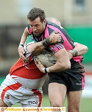 Paul Smith gets caught in a tackle. Paul Smith gets caught in a tackle.