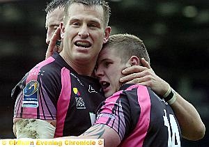 CENTRE OF ATTENTION . . . Alex Thompson celebrates his try - but things stopped going so well for him. 