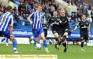 NO WAY THROUGH . . . Robbie Simpson looks to break Athletic’s goalless streak at Hillsborough yesterday. 
