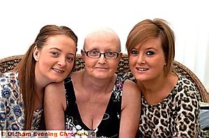 IN it together. . . Julie Lowe with daughters Vicky (left) and Emma 
