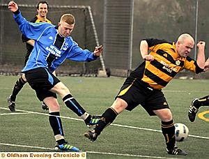 WORTH A GO: Rob Flynn (left), of Heyside, tries a shot during the Huddersfield and District League Division Two clash with Scholes. WORTH A GO: Rob Flynn (left), of Heyside, tries a shot during the Huddersfield and District League Division Two clash with Scholes.