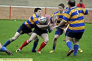 LET ME THROUGH: Andy Gorey (left)looks for a hole in the Burnley line. 
