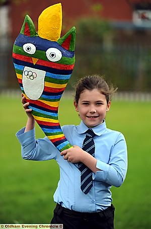 Ella White and her winning torch 
