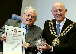 PROUD: Harry Burns receives the award from the Mayor, Councillor Richard Knowles
PROUD: Harry Burns receives the award from the Mayor, Councillor Richard Knowles