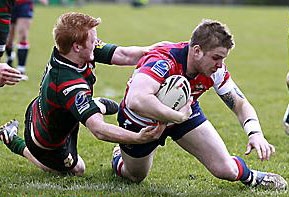 TRY TIME: Alex Thompson slides home for his first of a double. 