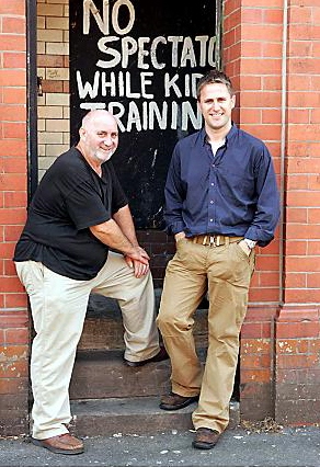 FATHER and son: Damian with his dad Brian outside the boxing gym in Collyhurst 
