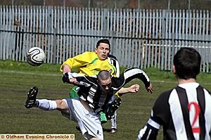 MY BALL . . . Michael Cheetham (back), of Royton Town, challenges Walshaw's Luke Chapman during their Manchester League Premier Division clash. MY BALL . . . Michael Cheetham (back), of Royton Town, challenges Walshaw's Luke Chapman during their Manchester League Premier Division clash.