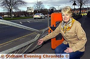 Jenny Barker and railings damaged since December at St Anne's Royton. Jenny Barker and railings damaged since December at St Anne's Royton.